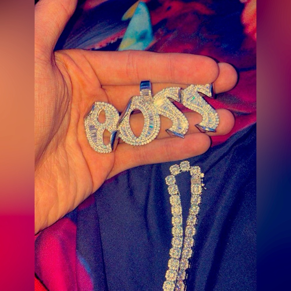 Silver and moissanite chain and pendant one "boss" pendant and a Simpson one
